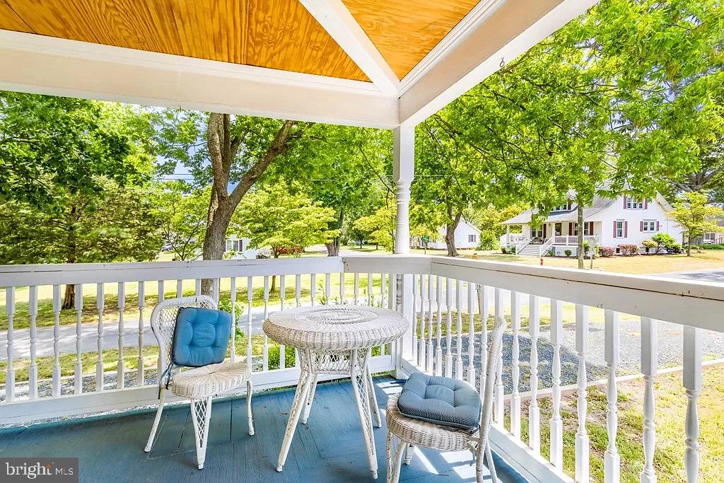 24171 Adelaide Street Parksley, VA 23421 - Photo 22 of 40 a view of a chairs and table in patio