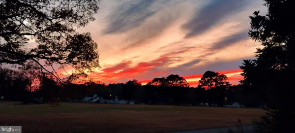 a white bath tub sitting in a bathroom