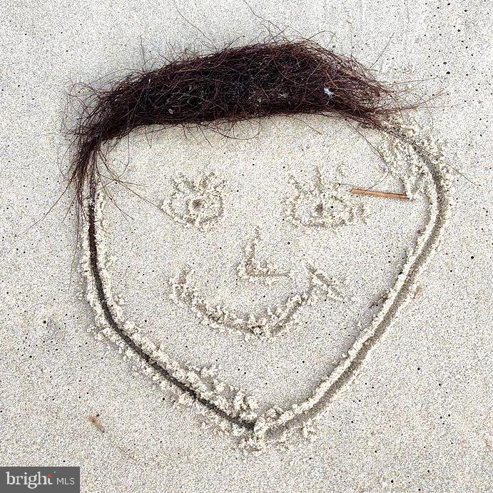 24171 Adelaide Street Parksley, VA 23421 - Photo 38 of 40 a white bath tub sitting in a bathroom