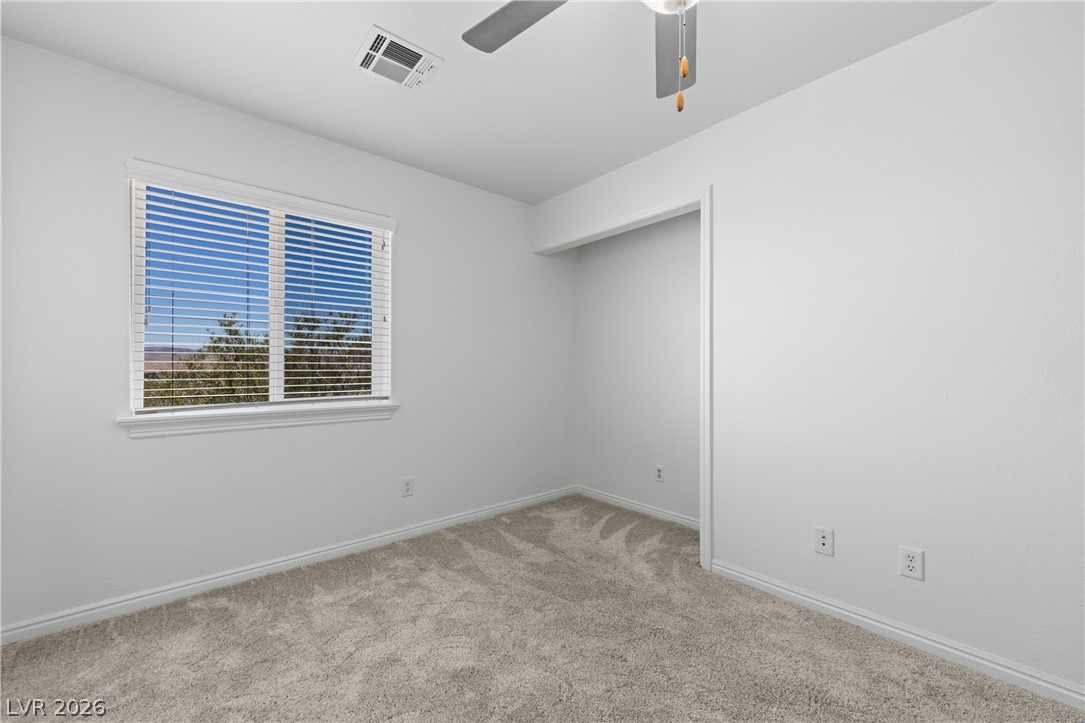 575 Gann Avenue Logandale, NV 89021 - Photo 42 of 75 A window in this bedroom offers serene outdoor views.