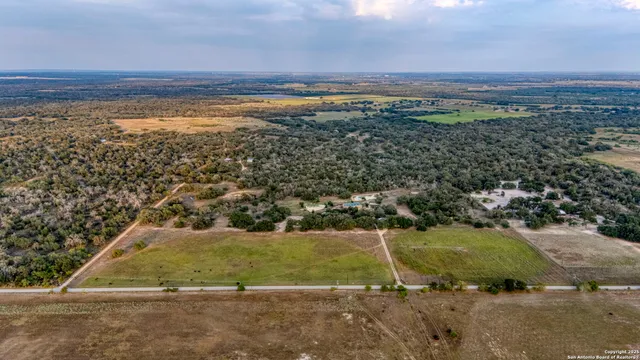a view of a pathway with a field