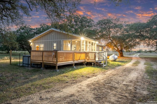 a view of an empty room with closet and a yard