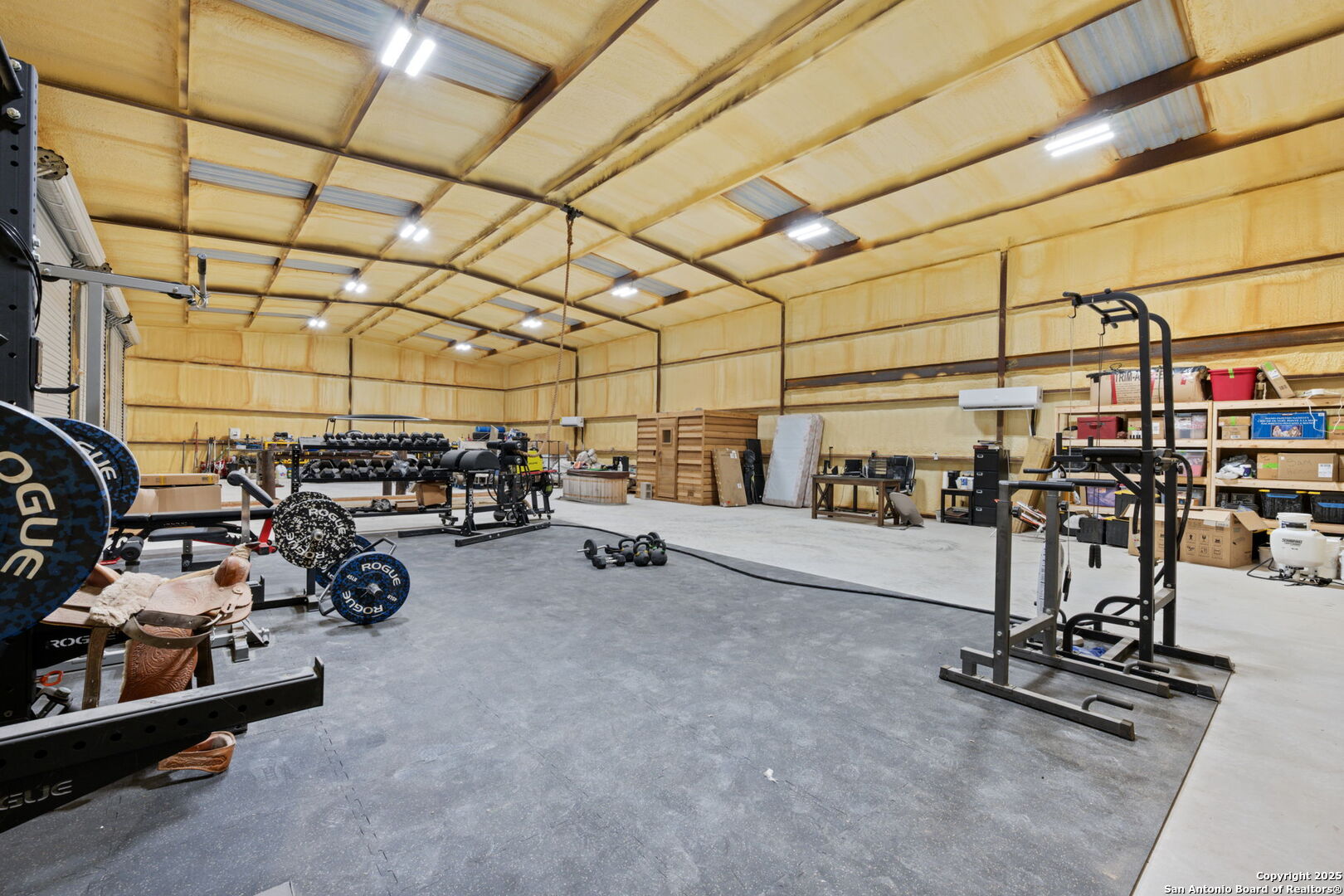 2605 Schuttig Road Pleasanton, TX 78064 - Photo 19 of 35 a view of a room with gym equipment