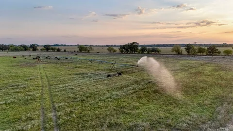 a view of a lake with a yard
