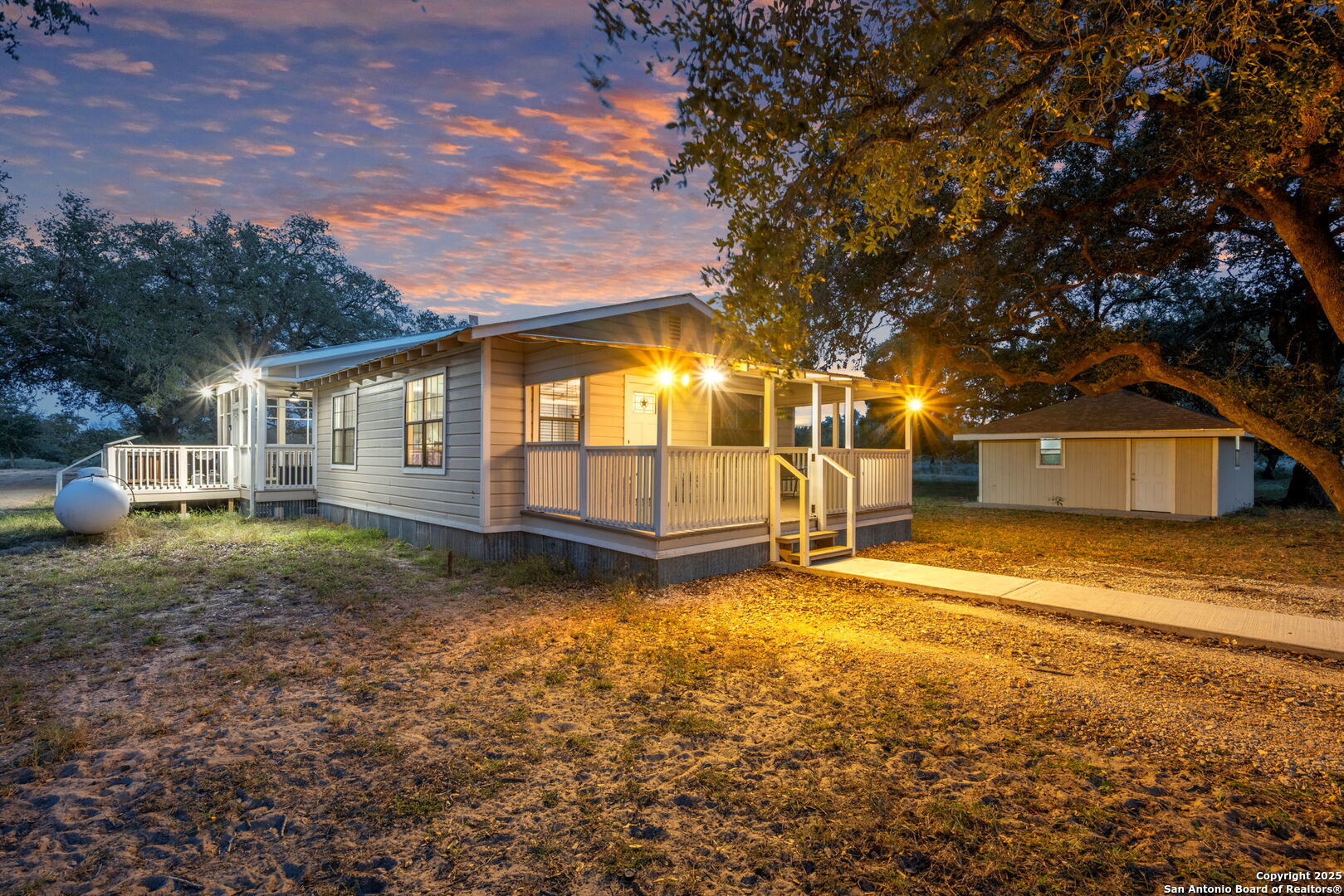2605 Schuttig Road Pleasanton, TX 78064 - Photo 3 of 35 a view of a house with a yard