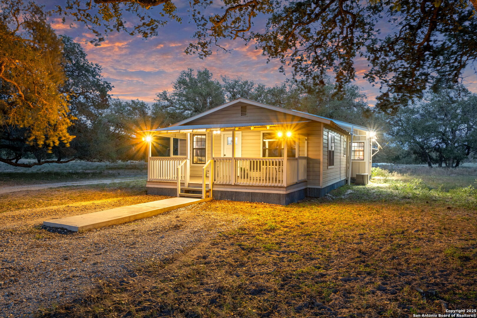 2605 Schuttig Road Pleasanton, TX 78064 - Photo 4 of 35 a view of an empty room with a yard