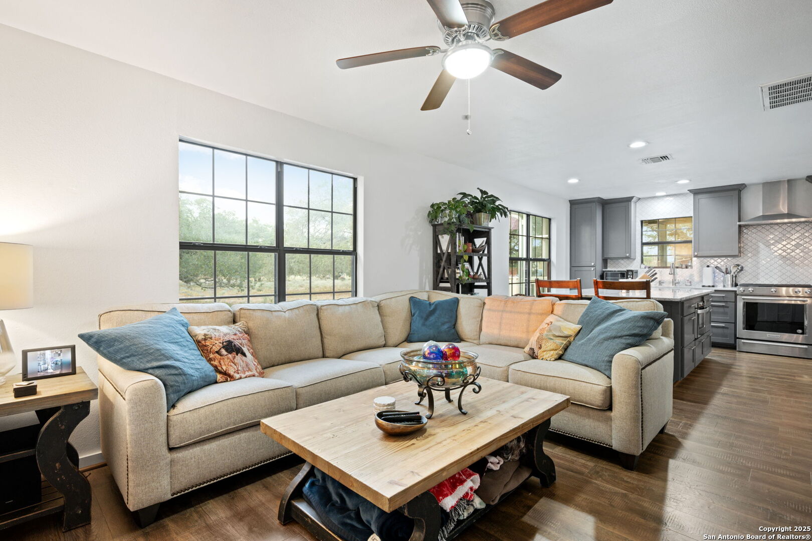 2605 Schuttig Road Pleasanton, TX 78064 - Photo 5 of 35 a living room with furniture kitchen view and a large window