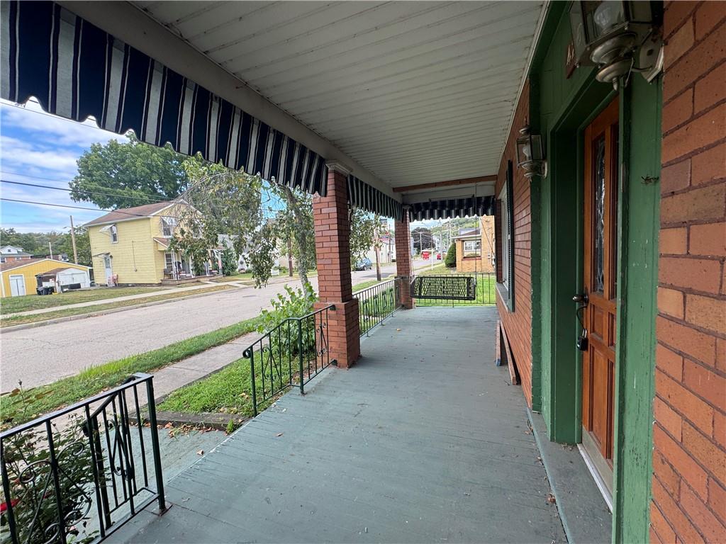 426 Beaver Street Wampum, PA 16157 - Photo 2 of 23 a view of a porch