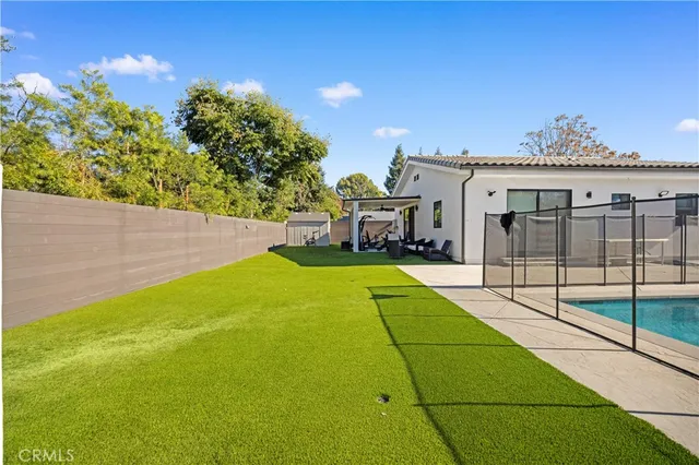 a view of a house with swimming pool
