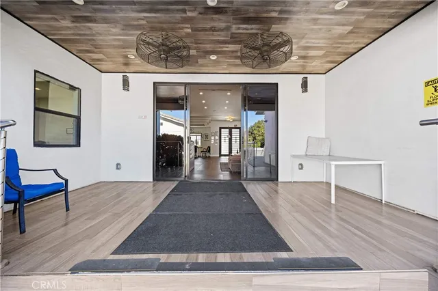 a view of a living room and bathroom