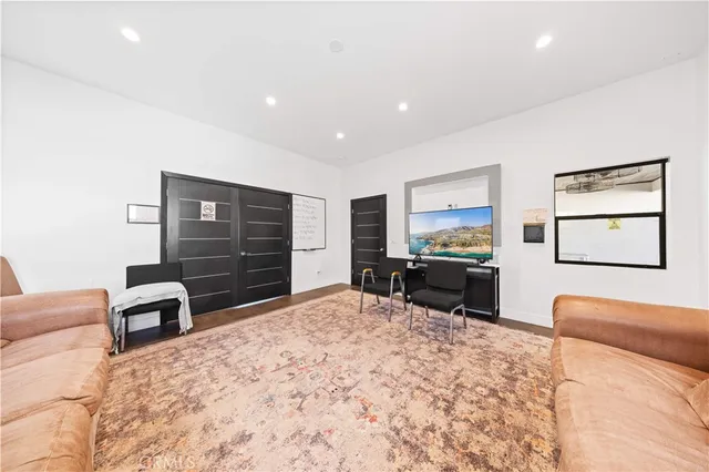 a bedroom with furniture and a bed