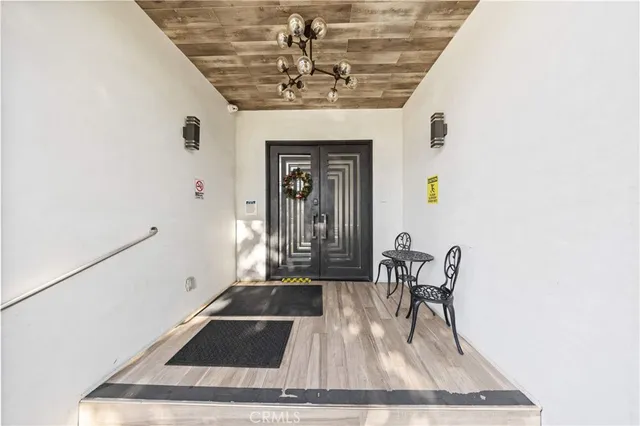 a view of a livingroom with furniture and window