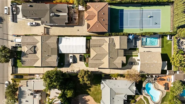 an aerial view of houses with outdoor space