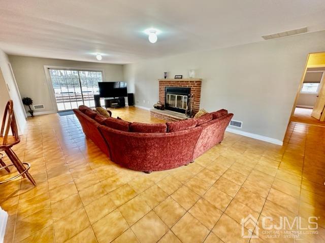 166 Lloyd Road Aberdeen, NJ 07747 - Photo 15 of 56 a room with table and chair