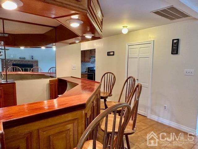 166 Lloyd Road Aberdeen, NJ 07747 - Photo 24 of 56 a view of a dining room with furniture