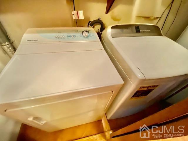 166 Lloyd Road Aberdeen, NJ 07747 - Photo 43 of 56 a utility room with dryer and washer