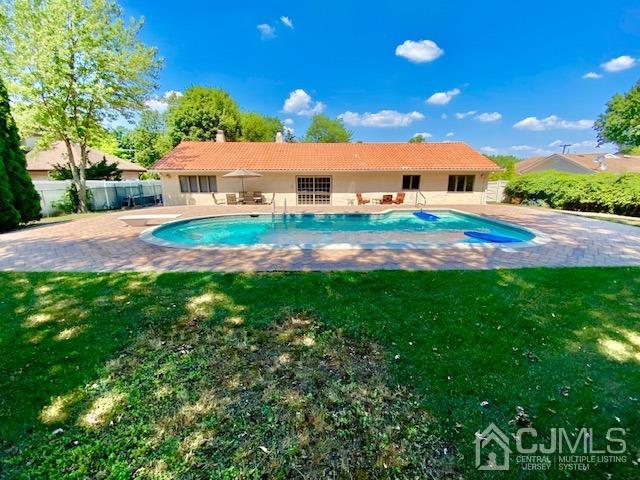 166 Lloyd Road Aberdeen, NJ 07747 - Photo 44 of 56 a aerial view of a house with yard and outdoor seating