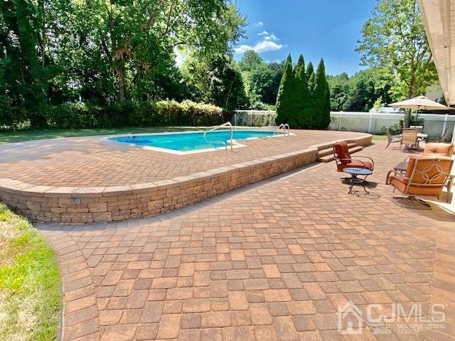 166 Lloyd Road Aberdeen, NJ 07747 - Photo 51 of 56 a view of a backyard of the house