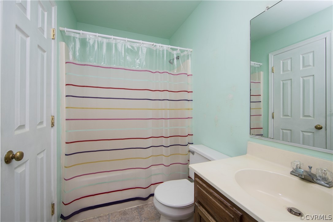 5618 Chatmoss Road Midlothian, VA 23112 - Photo 15 of 25 a bathroom with a sink a toilet and shower