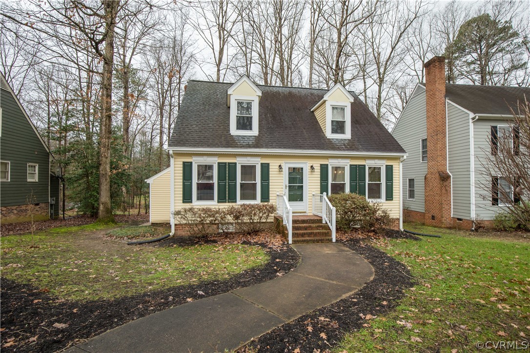 5618 Chatmoss Road Midlothian, VA 23112 - Photo 2 of 25 a front view of a house with garden and porch