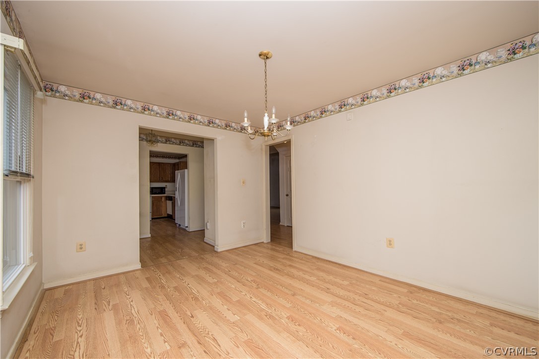 5618 Chatmoss Road Midlothian, VA 23112 - Photo 5 of 25 a view of a hallway with a chandelier