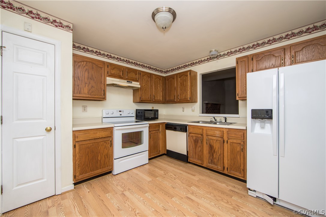 5618 Chatmoss Road Midlothian, VA 23112 - Photo 6 of 25 a kitchen with stainless steel appliances granite countertop a refrigerator sink and cabinets