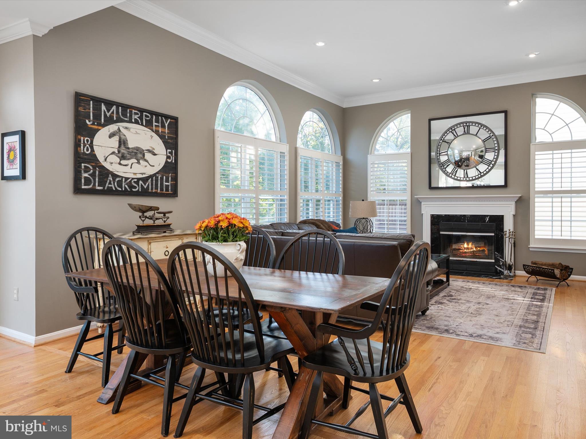 6209 Gatepost Way Elkridge, MD 21075 - Photo 17 of 74 a view of a a dining room with furniture window and wooden floor