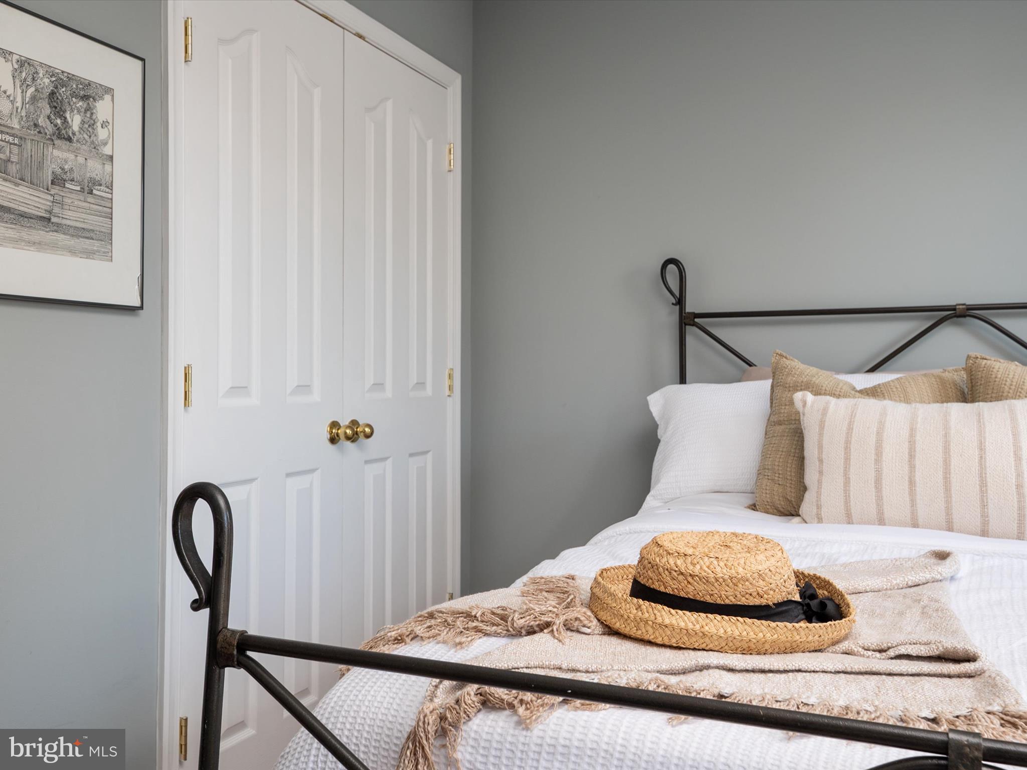 6209 Gatepost Way Elkridge, MD 21075 - Photo 37 of 74 a bedroom with a bed and wooden floor