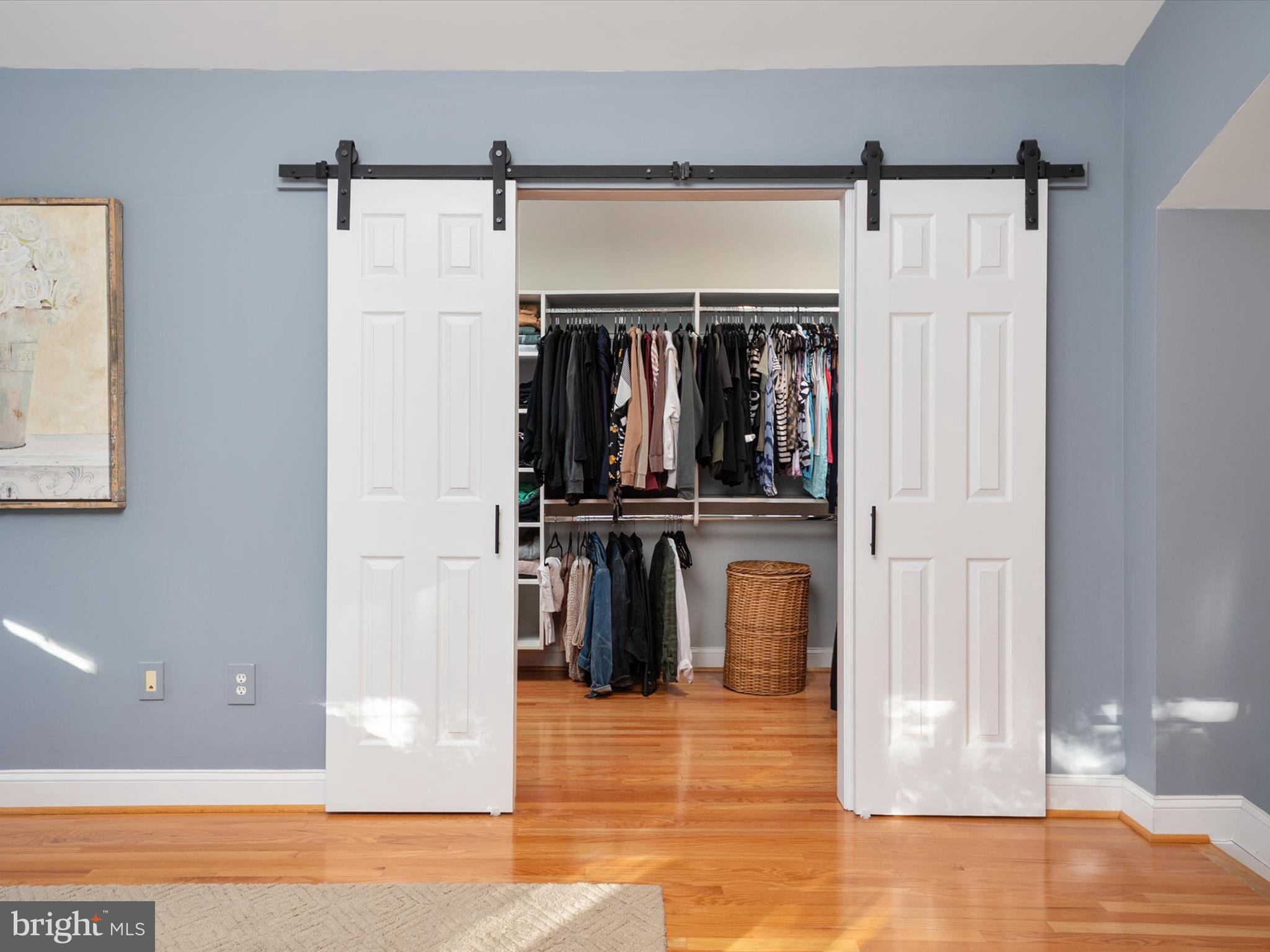 6209 Gatepost Way Elkridge, MD 21075 - Photo 41 of 74 a view of walk in closet with clothes and shoes