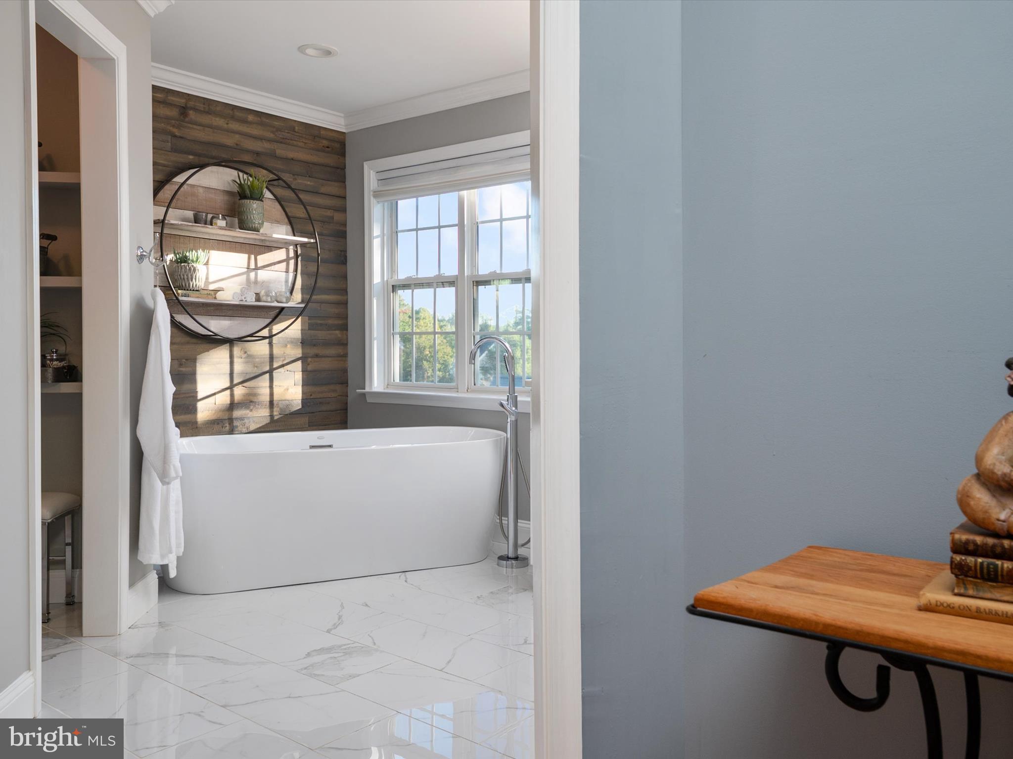 6209 Gatepost Way Elkridge, MD 21075 - Photo 42 of 74 a living room with a couch and a window