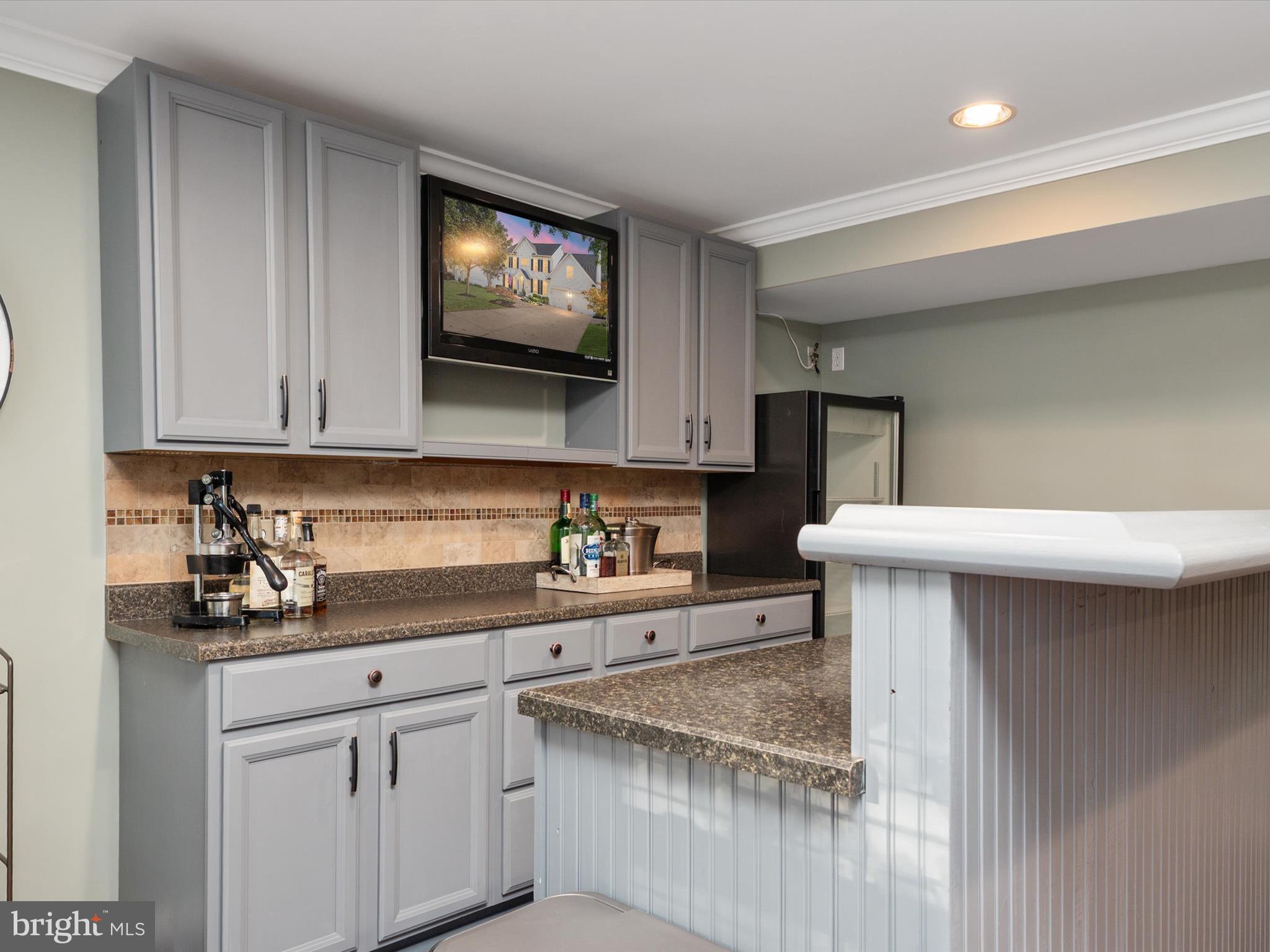6209 Gatepost Way Elkridge, MD 21075 - Photo 48 of 74 a kitchen with stainless steel appliances granite countertop a sink and a microwave