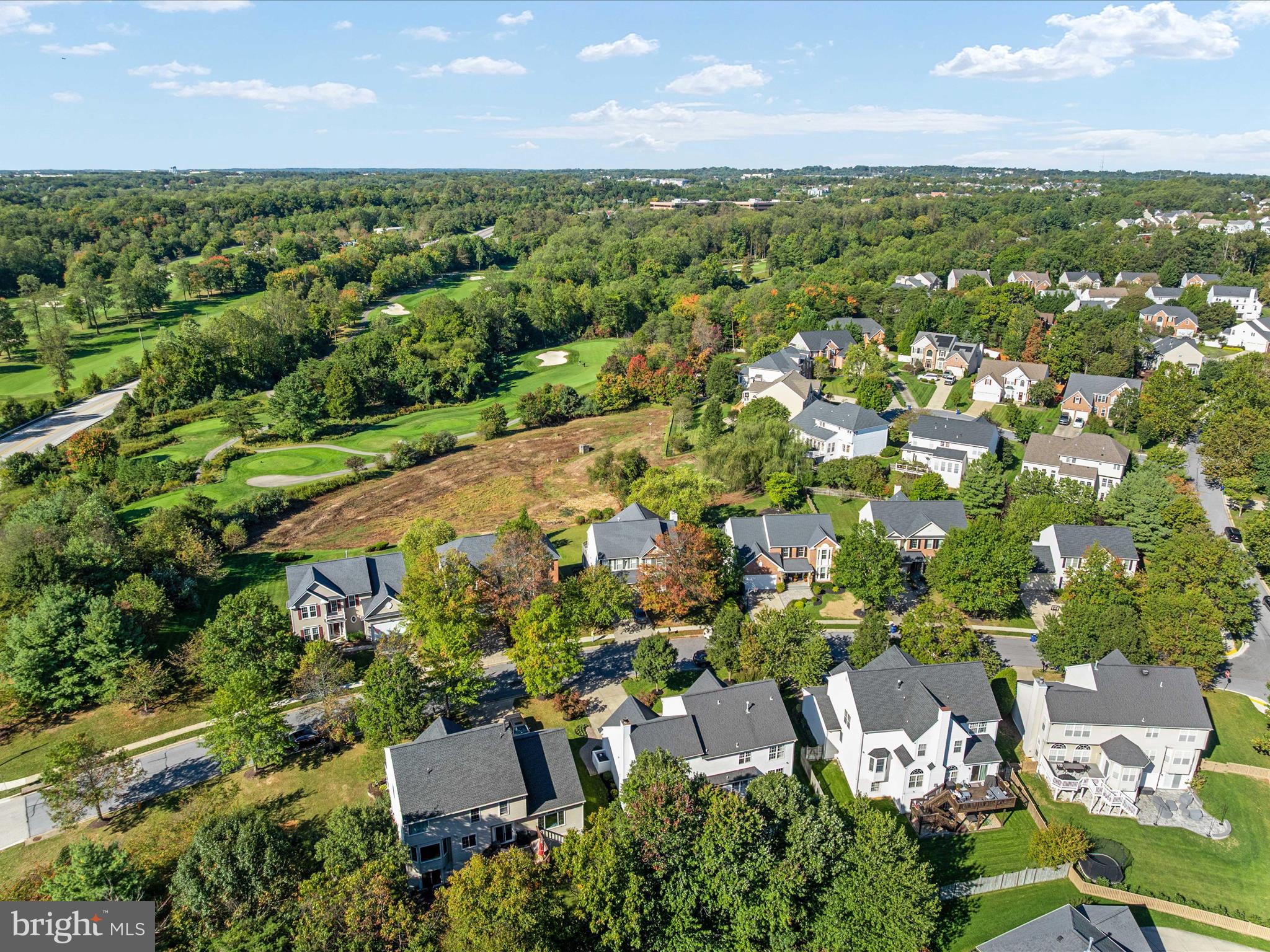 6209 Gatepost Way Elkridge, MD 21075 - Photo 52 of 74 an aerial view of residential houses with outdoor space and trees