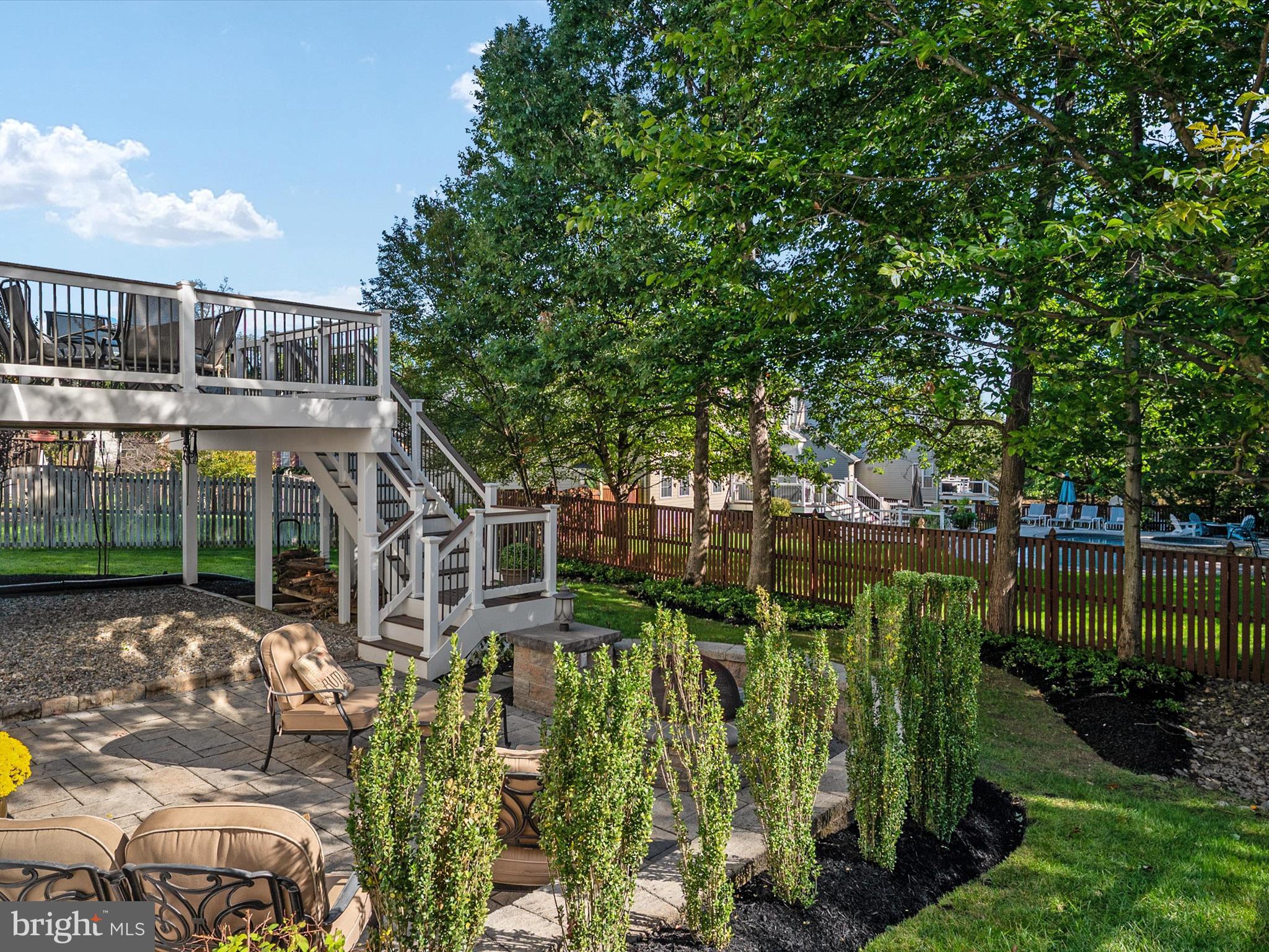 6209 Gatepost Way Elkridge, MD 21075 - Photo 59 of 74 a front view of a house with a yard and potted plants