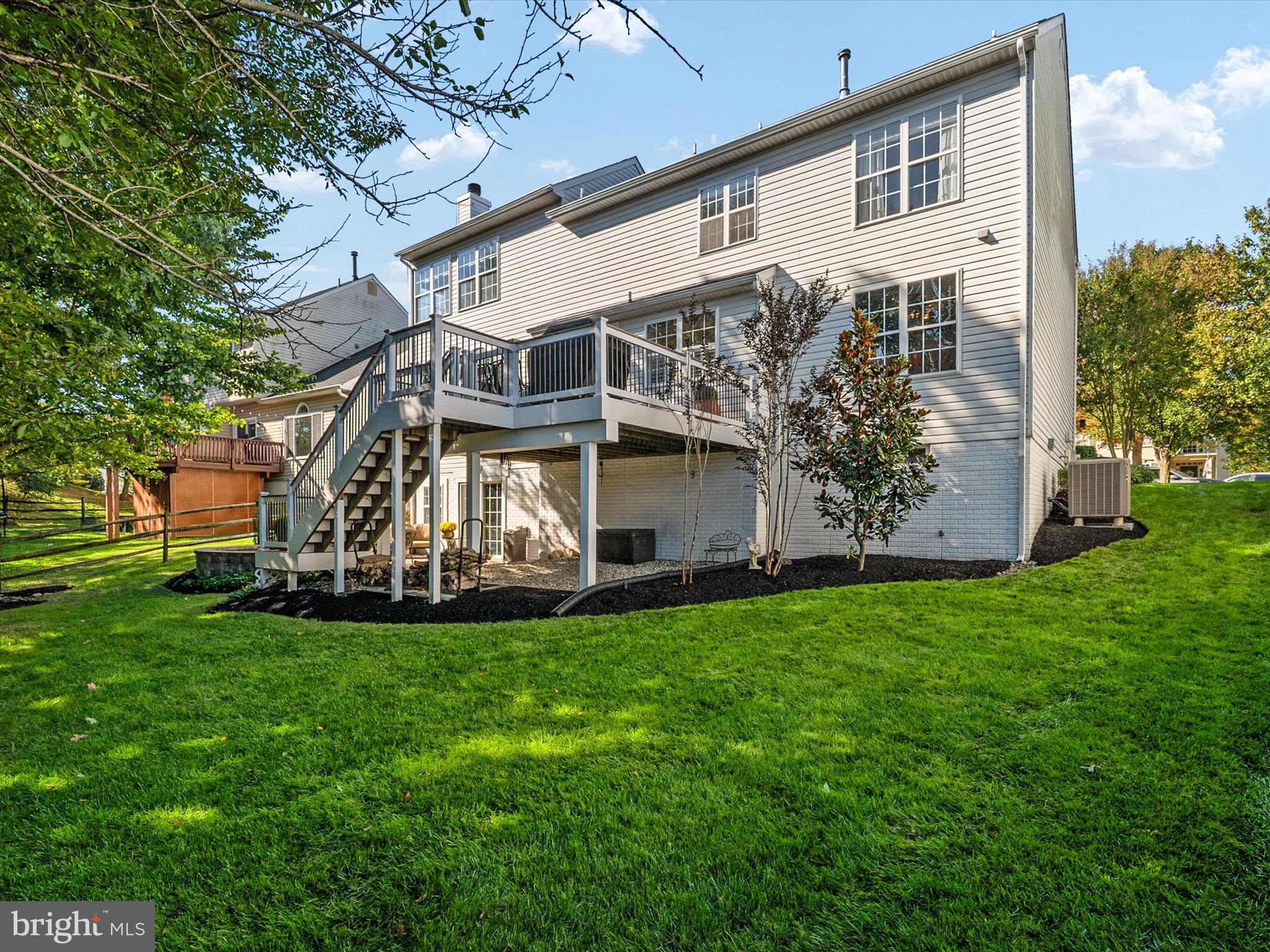 6209 Gatepost Way Elkridge, MD 21075 - Photo 60 of 74 a view of a house with a yard