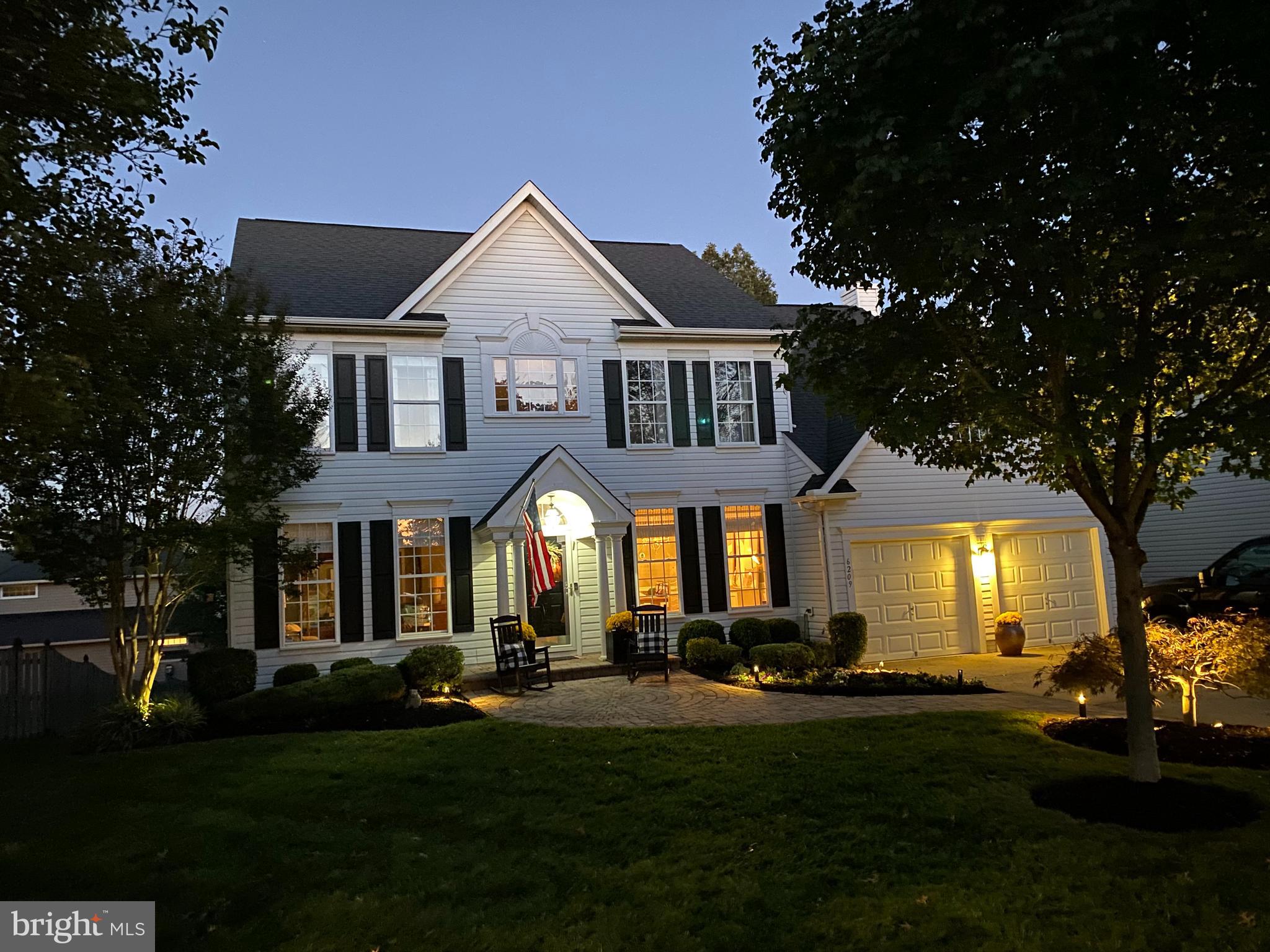 6209 Gatepost Way Elkridge, MD 21075 - Photo 63 of 74 a front view of a house with a yard