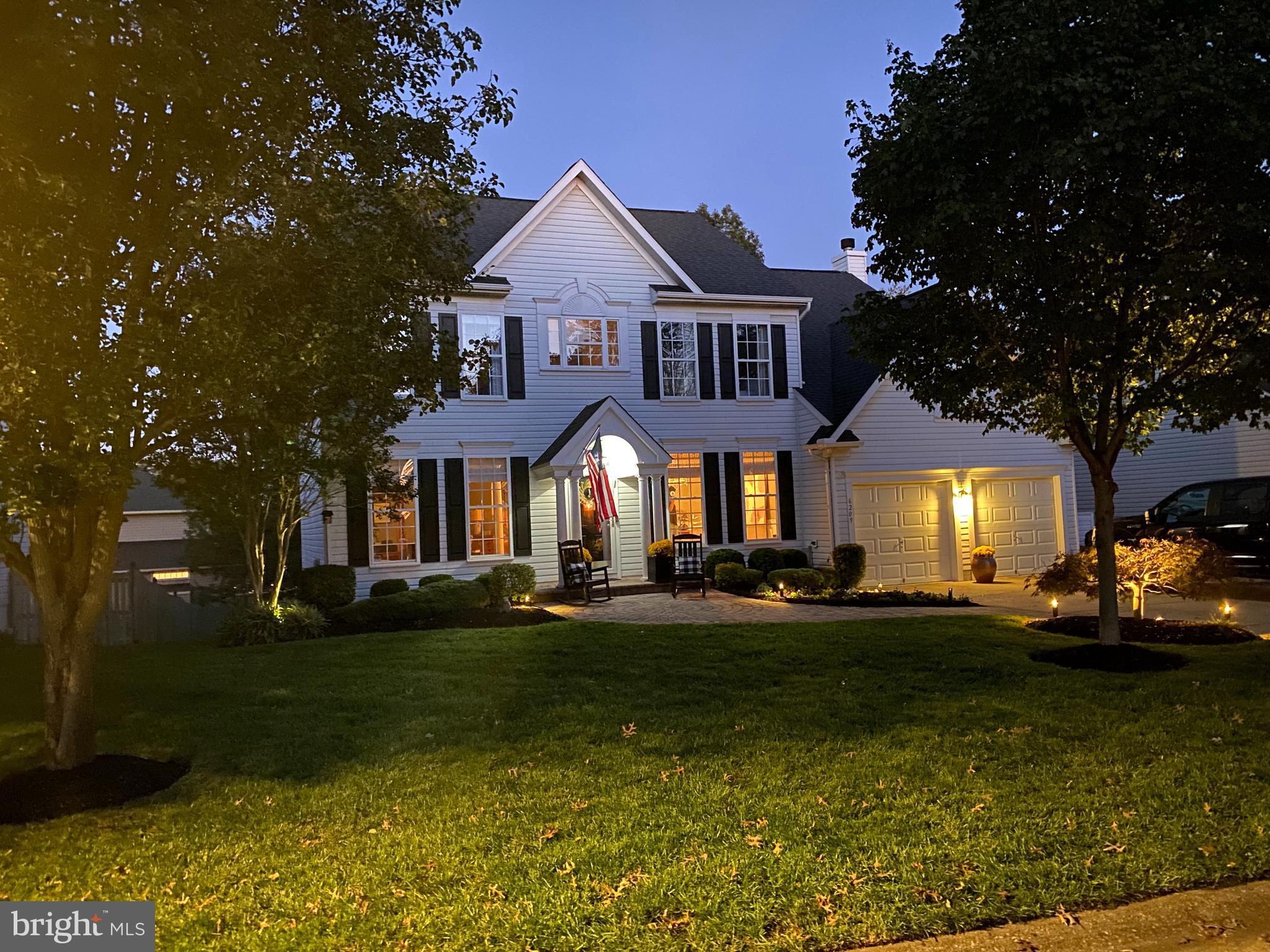 6209 Gatepost Way Elkridge, MD 21075 - Photo 67 of 74 a front view of a house with a yard