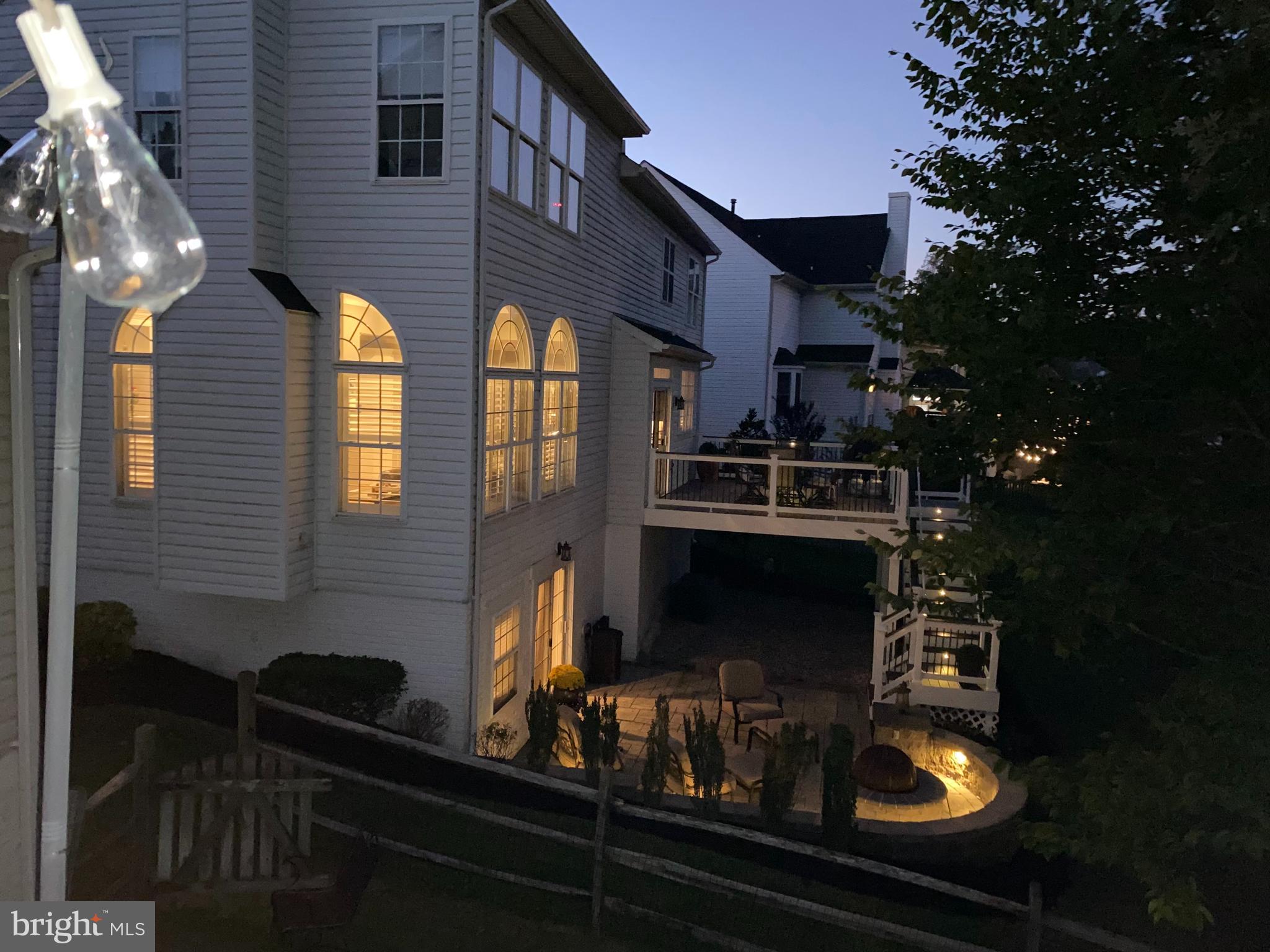 6209 Gatepost Way Elkridge, MD 21075 - Photo 69 of 74 a front view of a house with barbeque oven and outdoor seating