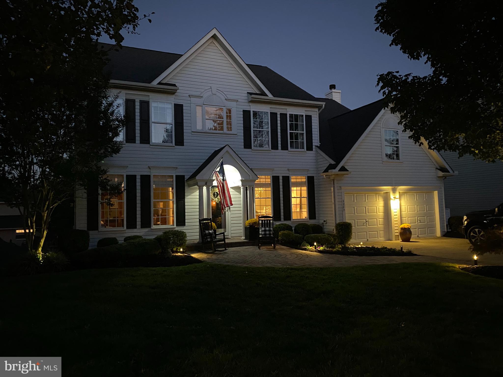 6209 Gatepost Way Elkridge, MD 21075 - Photo 71 of 74 a front view of a house with a yard