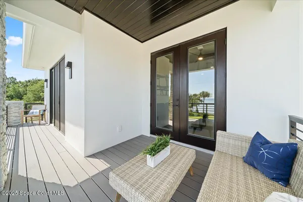 a bed room with a bed and a couch