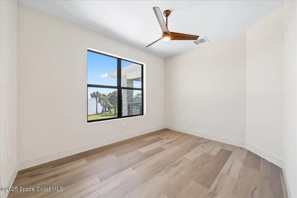 an empty room with windows