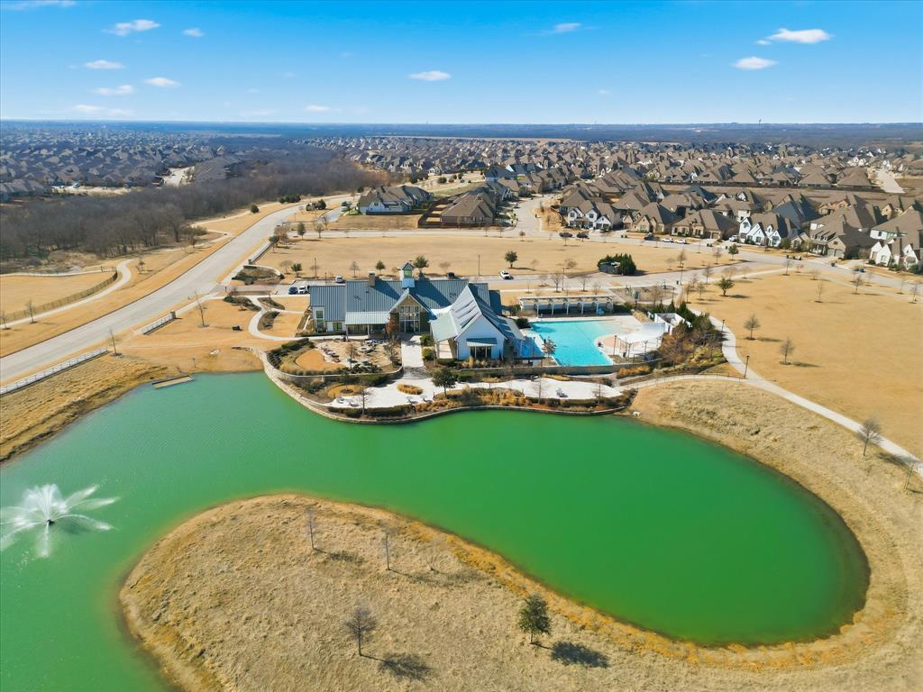 1701 Shetland Road Aubrey, TX 76227 - Photo 28 of 31 an aerial view of a house with a lake view