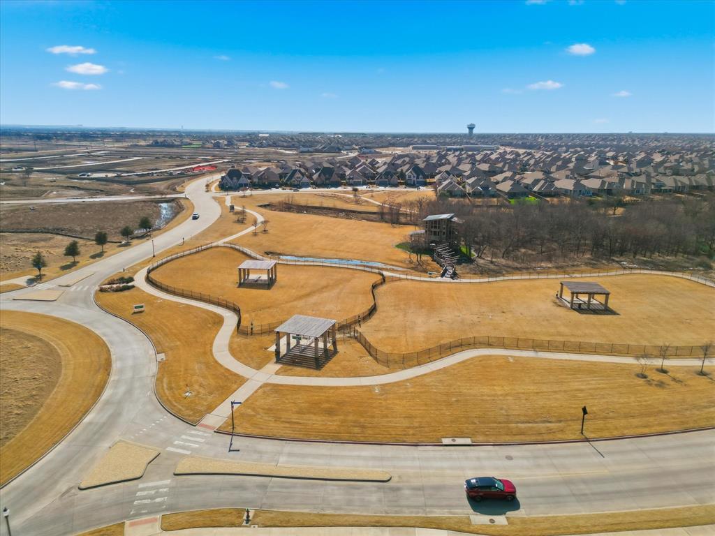 1701 Shetland Road Aubrey, TX 76227 - Photo 29 of 31 an aerial view of residential houses with outdoor space