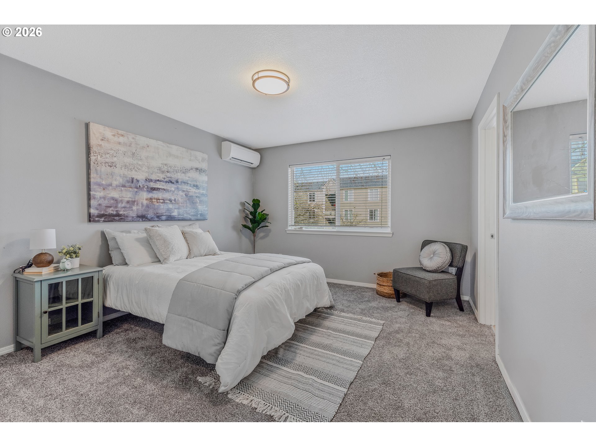 19159 Southeast Yamhill Street, Unit 15 Portland, OR 97233 - Photo 12 of 23 a bedroom with a bed and a couch