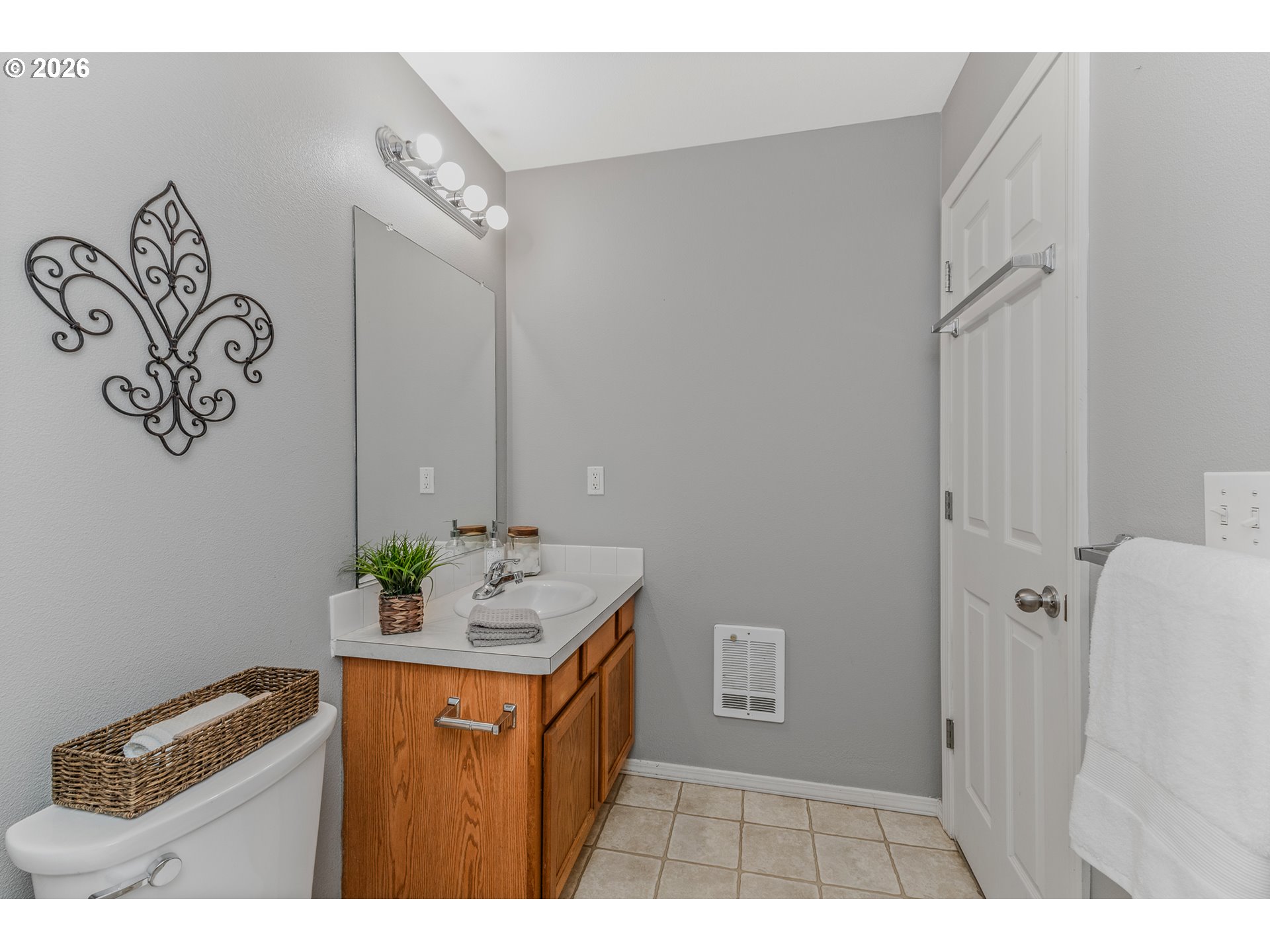 19159 Southeast Yamhill Street, Unit 15 Portland, OR 97233 - Photo 22 of 23 a bathroom with a sink and a mirror