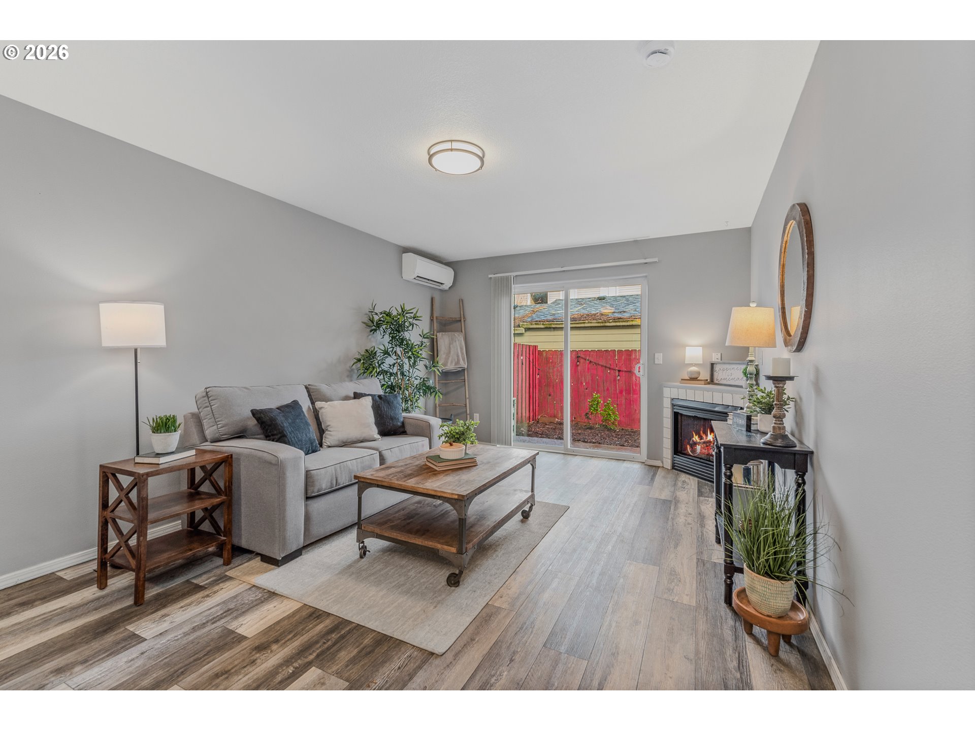 19159 Southeast Yamhill Street, Unit 15 Portland, OR 97233 - Photo 7 of 23 a living room with furniture and a table