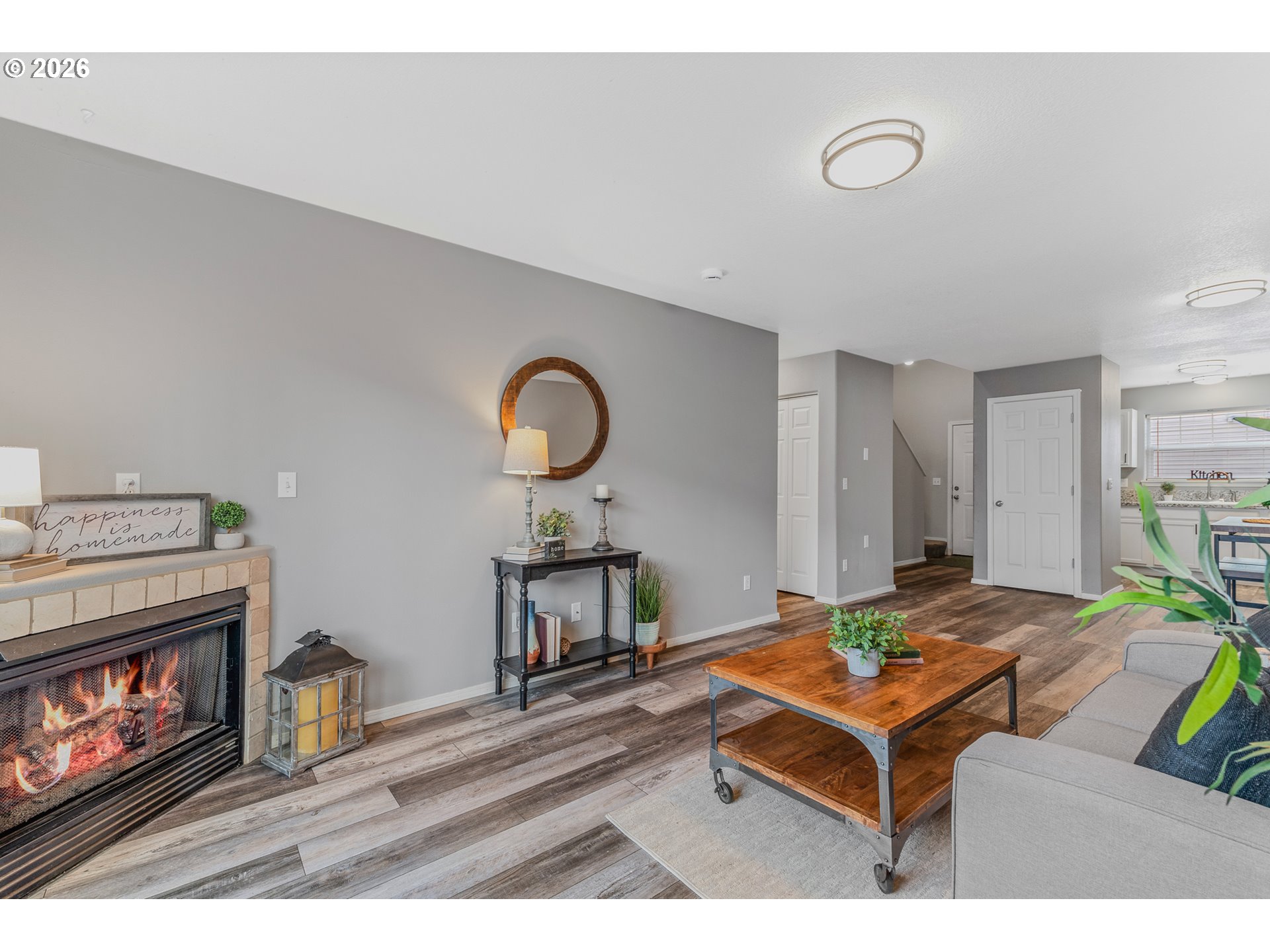 19159 Southeast Yamhill Street, Unit 15 Portland, OR 97233 - Photo 9 of 23 a living room with furniture and a fireplace