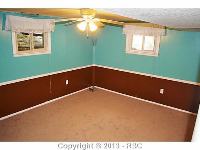 960 Hidden Valley Road Colorado Springs, CO 80919 - Photo 9 of 21 One of three basement bedrooms.