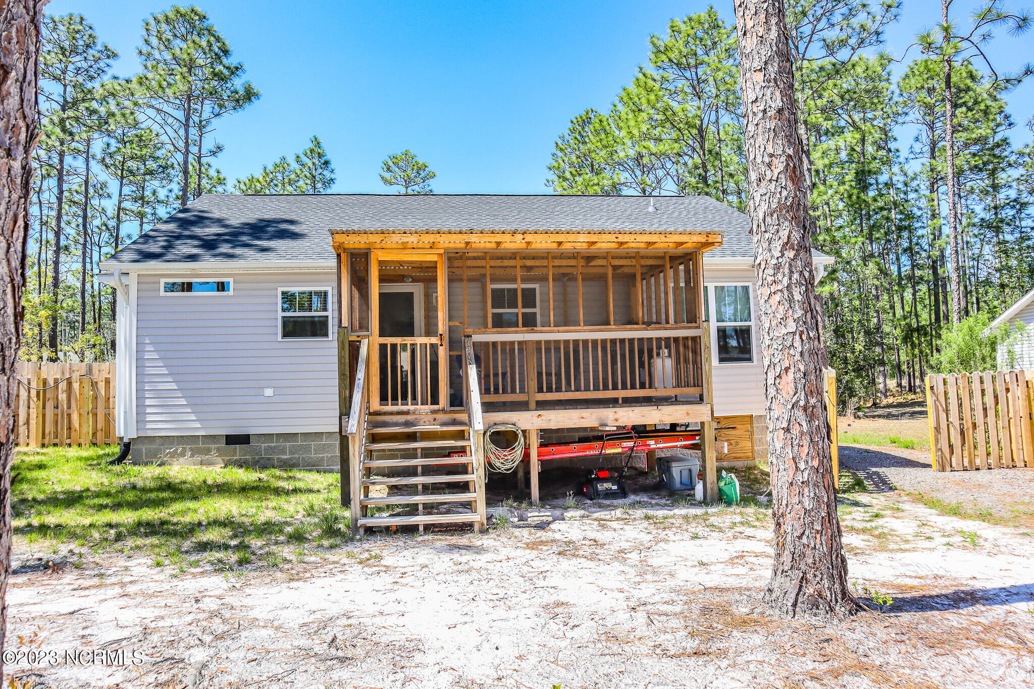1340 Maple Road Southport, NC 28461 - Photo 46 of 63 Oversized fenced backyard with gate to allow easy access for trailers or a boat.