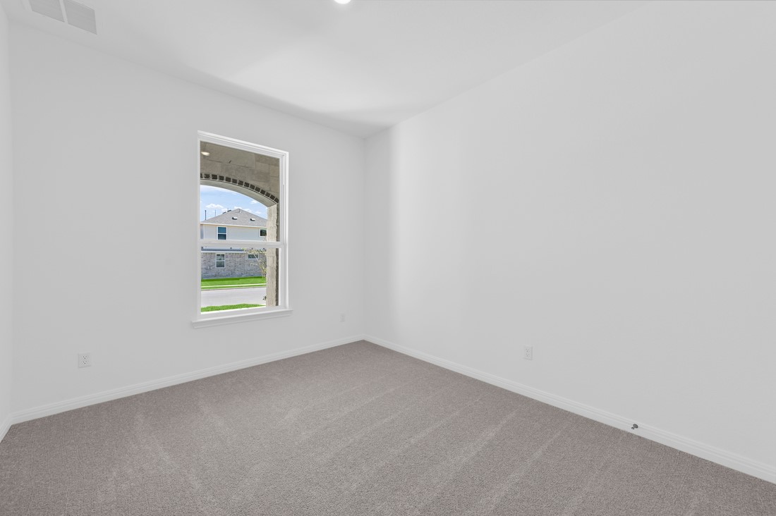 113 Wingstem Way Georgetown, TX 78633 - Photo 12 of 37 a view of an empty room with a window