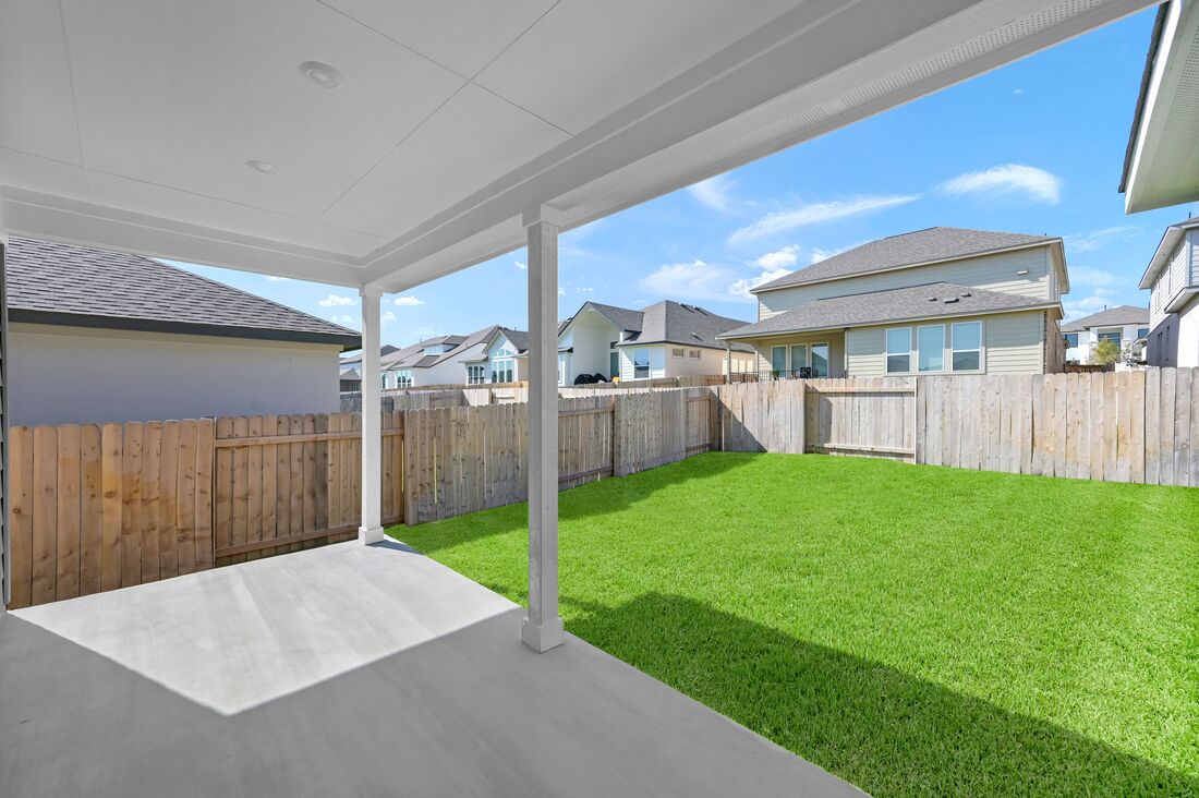 113 Wingstem Way Georgetown, TX 78633 - Photo 16 of 37 a view of a backyard with a garden